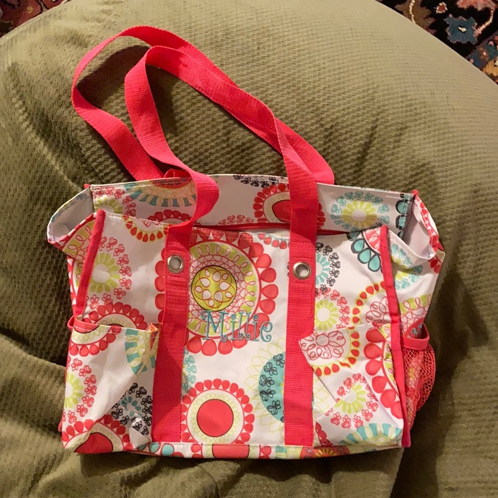 Thirty one bag with Millie embroidered on it